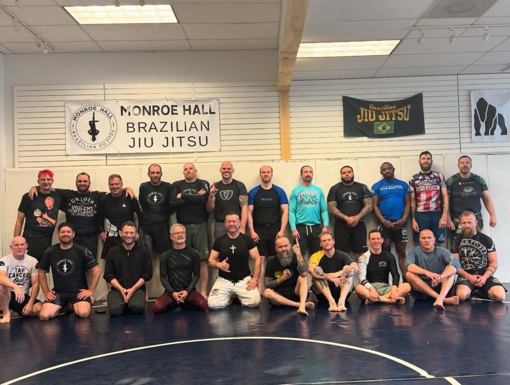 A group photo of attendees at the Woden Cup scrimmage at Monroe Hall BJJ in Towson, MD in May of 2025.